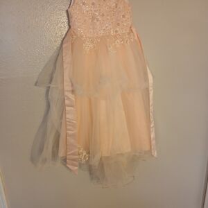 Charming Peach Kids Dress with Floral Details